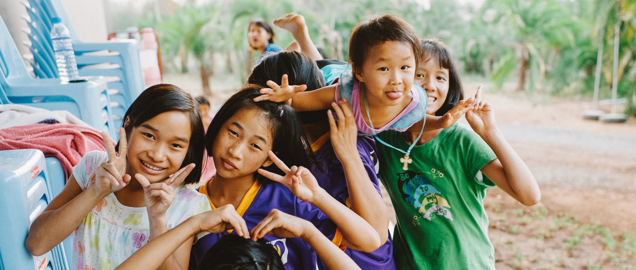 A group of children smiling together