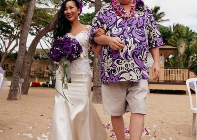 Carl walking Nhu down the aisle