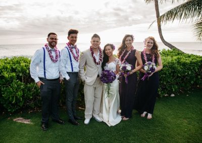 Nhu and her husband posing with their wedding party
