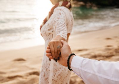 Nhu holding her husband's hand