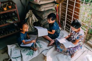 Three girls studying together