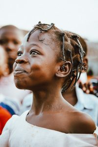 A confident, smiling girl.