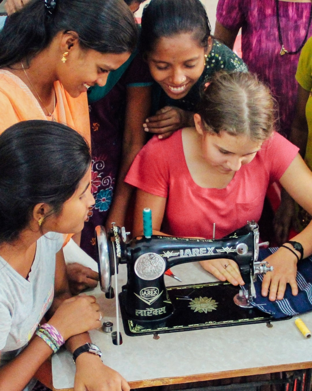 A girl standing in a field.